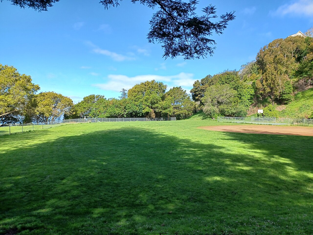 An empty baseball diamond at Glendale-La Loma Park in Berkeley, California, photographed in 2023