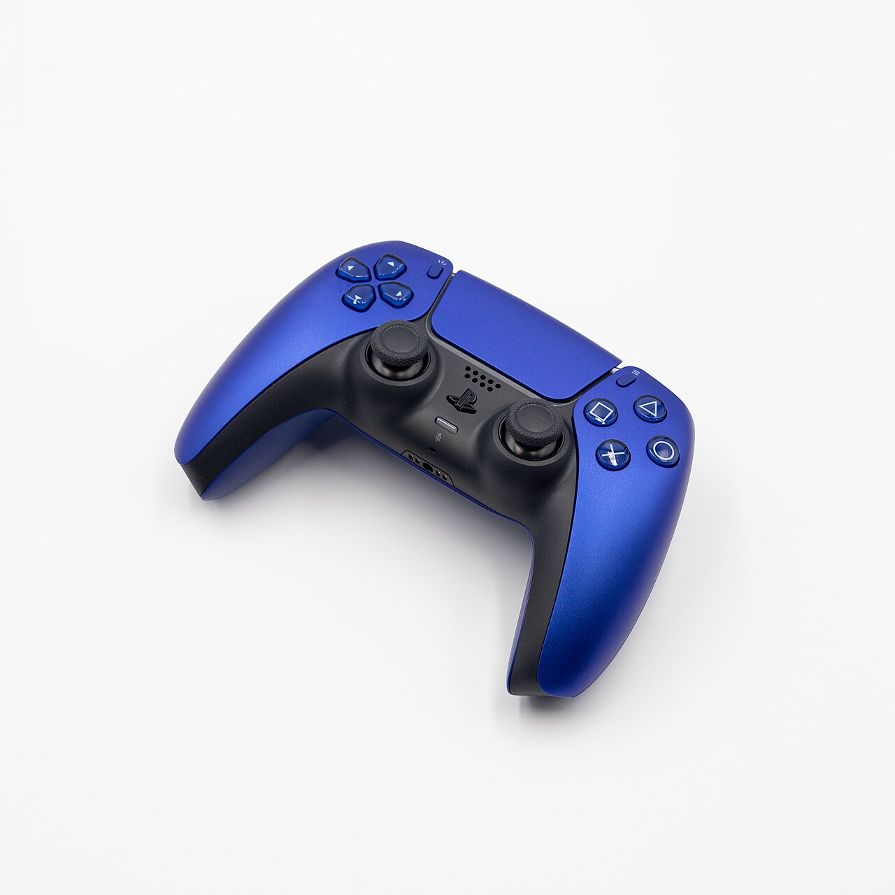 An existing Cobalt Blue DualSense controller, not one of the new transparent Prism colors