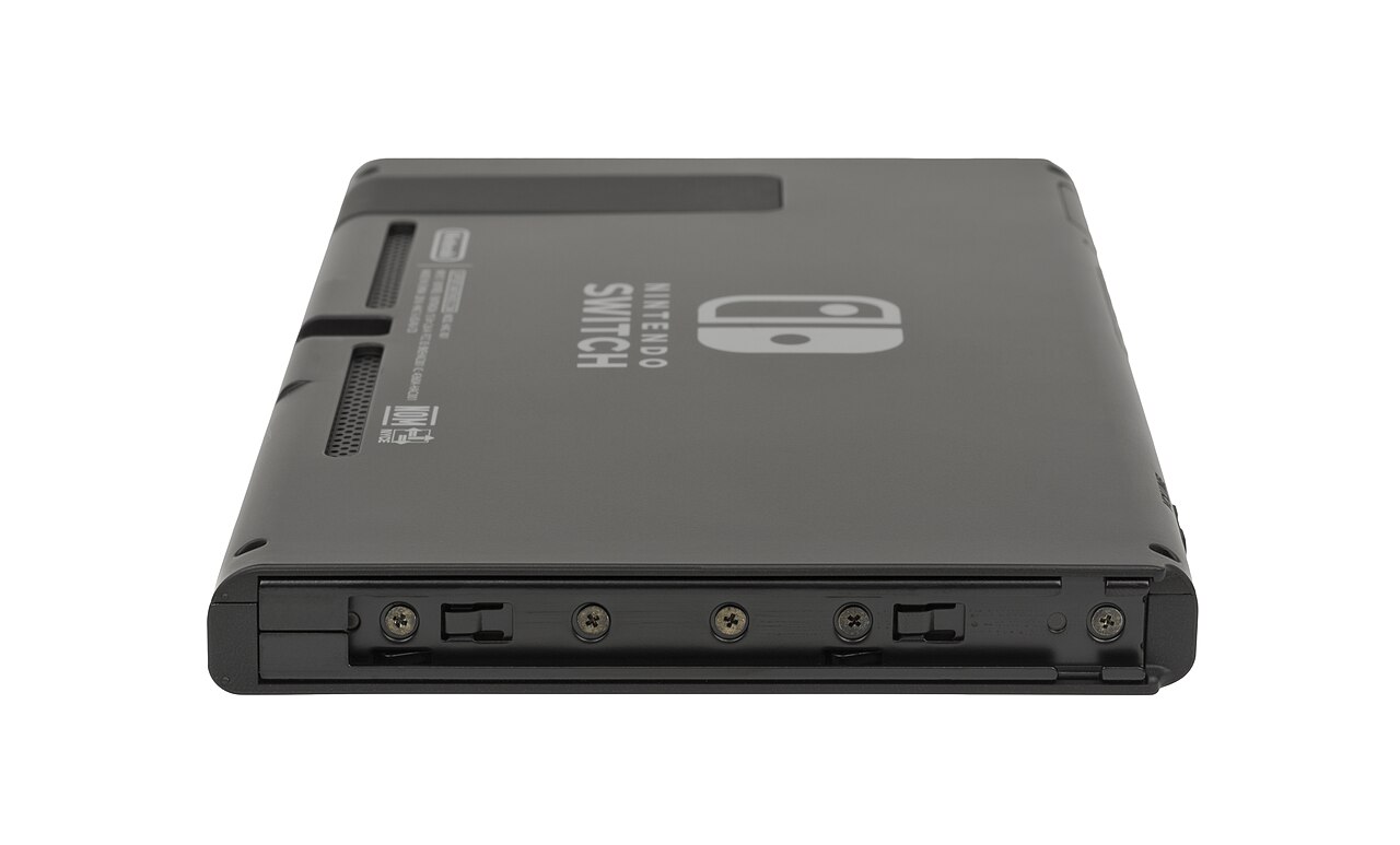 Side and rear of an original Nintendo Switch console without Joy-Con controllers, photographed on a white background